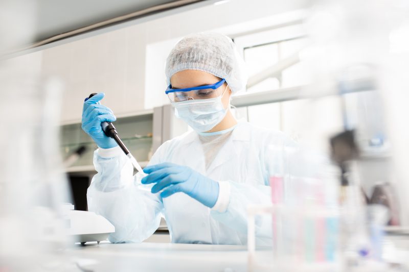 female in laboratory using pipette (1)